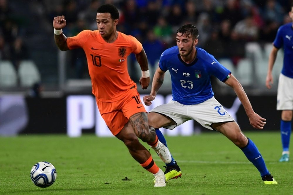 Koeman's Holland came from behind to draw. AFP