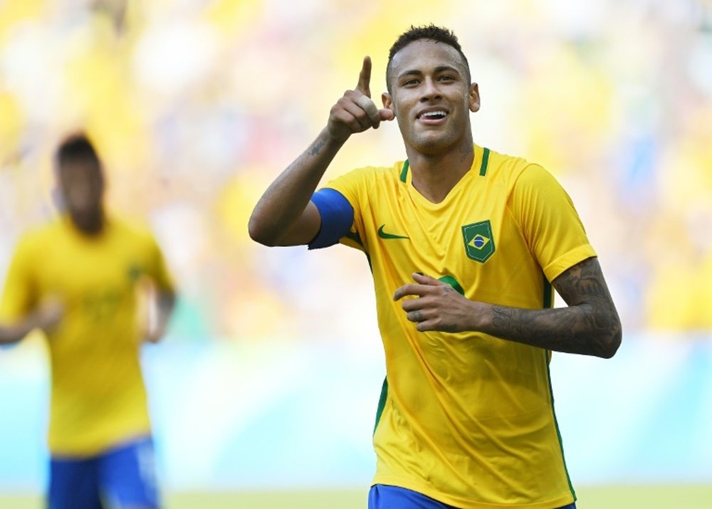 Neymar celebrates scoring in Brazil's 7-1 rout of Honduras. AFP