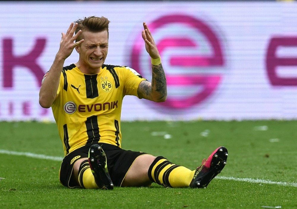 Marco Reus podría estar cuatro meses apartado de los terrenos de juego. Archivo/EFE/AFP