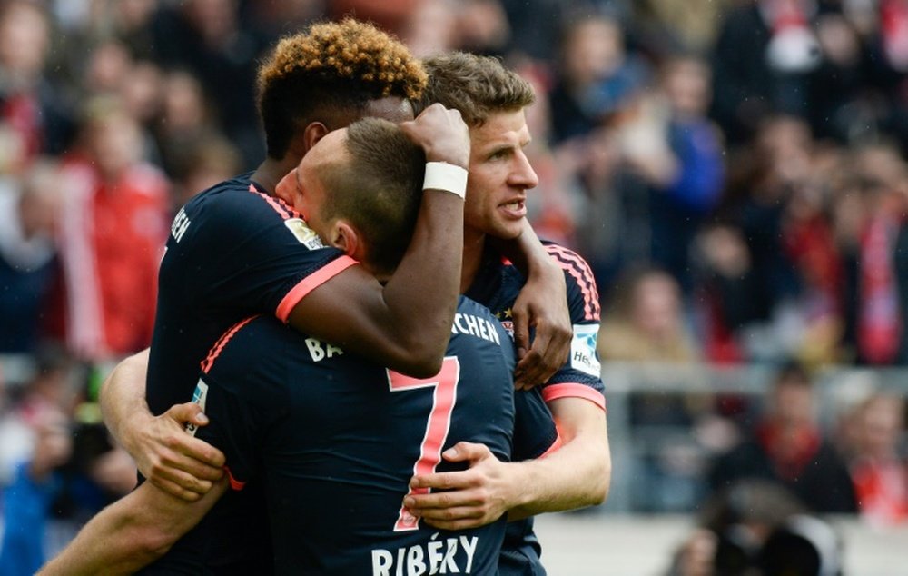 (L-R) Bayern Munichs David Alaba, Franck Ribery and Thomas Mueller celebrate. BeSoccer