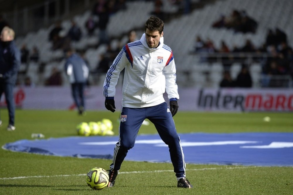 Yoann Gourcuff warms up prior to the French L1 football match Olympique Lyonnais vs FC Metz on January 25, 2015, at the Gerland Stadium in Lyon