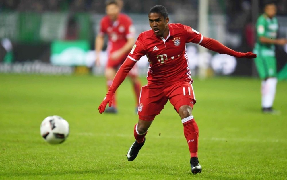 Midfielder Douglas Costa should leave Bayern and play for Juventus. AFP