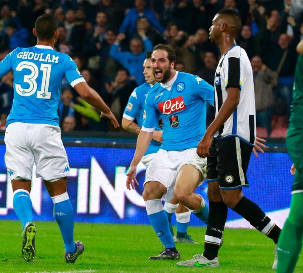 Napolis Gonzalo Higuain (C) celebrates after scoring a goal during their Italian Serie A match against Udinese, at the San Paolo stadium in Naples, on November 8, 2015