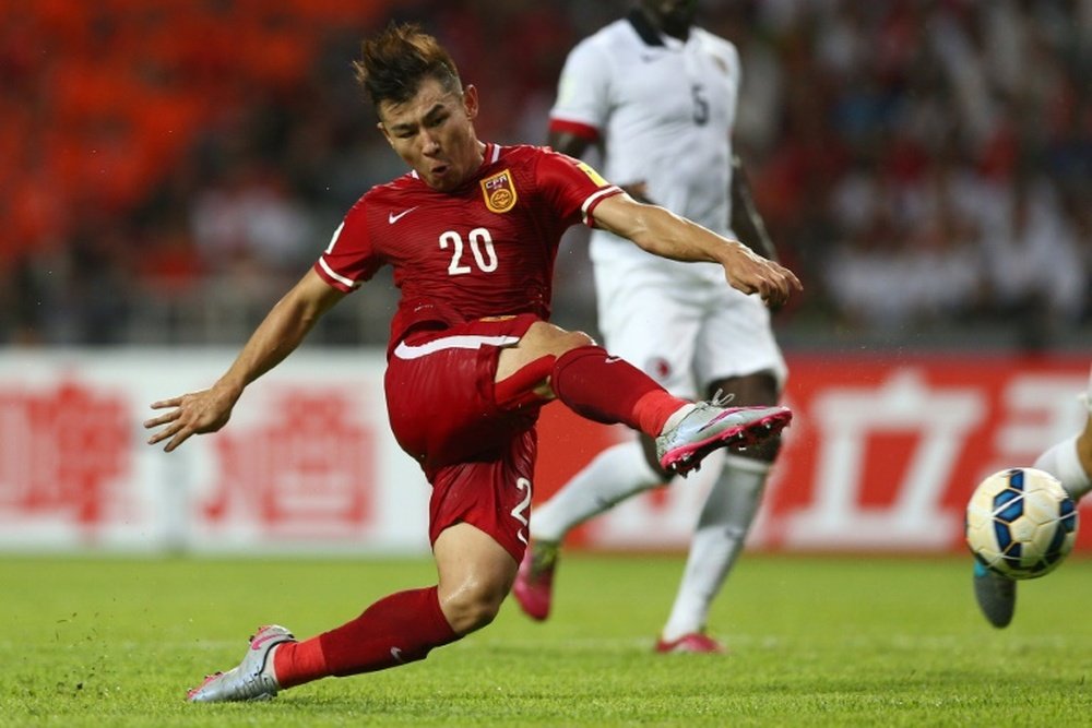 Chinas Yu Hanchao shoots at goal during a World Cup qualifier against Hong Kong in Shenzhen, southern China, on September 3, 2015