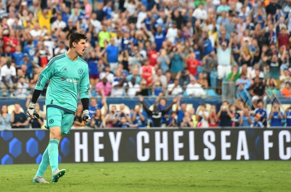 Chelsea goalkeeper Thibaut Courtois reacts after scoring the winning goal during a penalty shootout against PSG at an International Champions Cup football match in Charlotte, North Carolina, on July 25, 2015