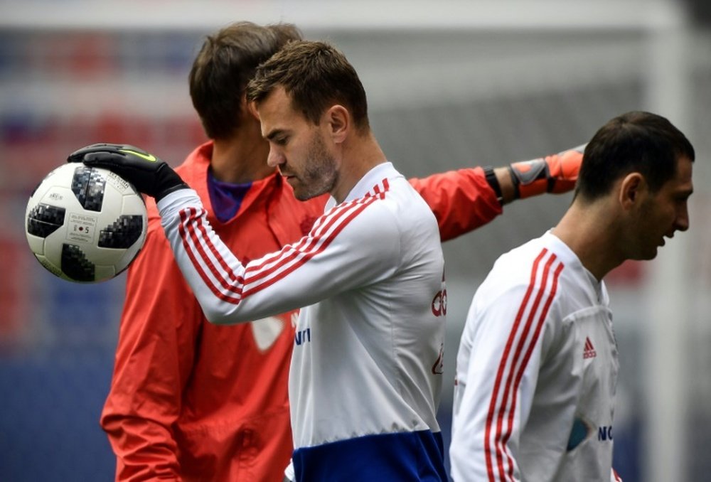 Akinfeev is Russia's best-known player. AFP