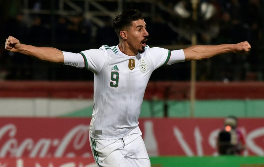 aghdad Bounedjah celebrates scoring for Algeria. EFE