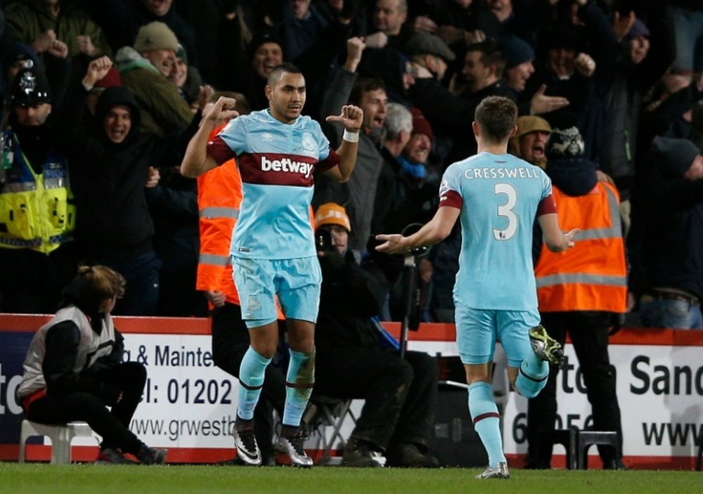 West Ham Uniteds midfielder Dimitri Payet (L) celebrates after scoring during the match between Bournemouth and West Ham United on January 12, 2016