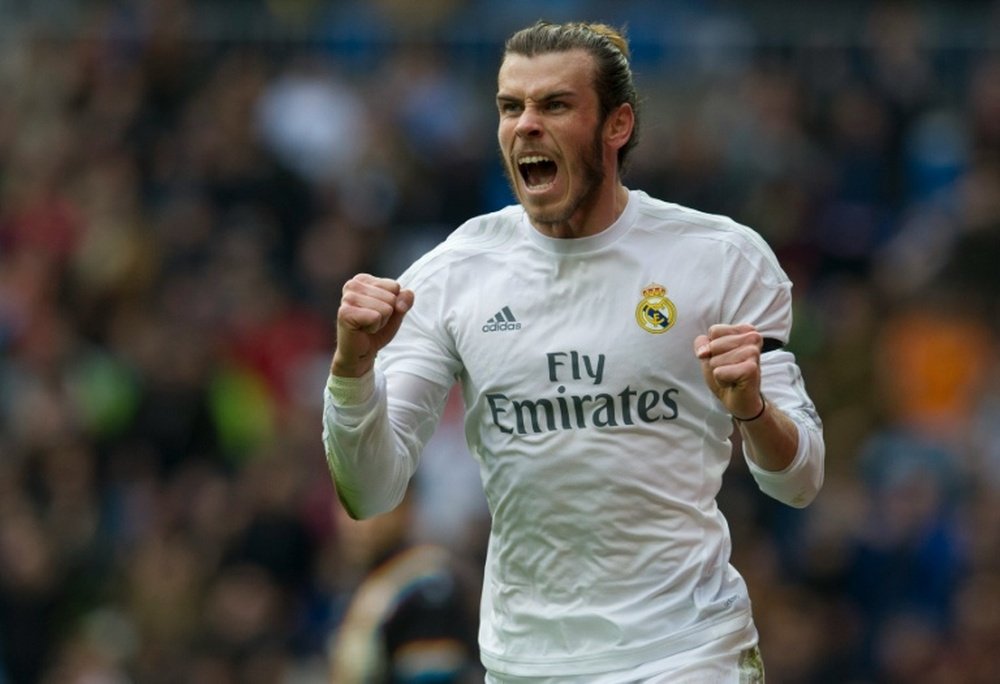 Real Madrids Gareth Bale celebrates after scoring during the match against Rayo Vallecano de Madrid in Madrid on December 20, 2015