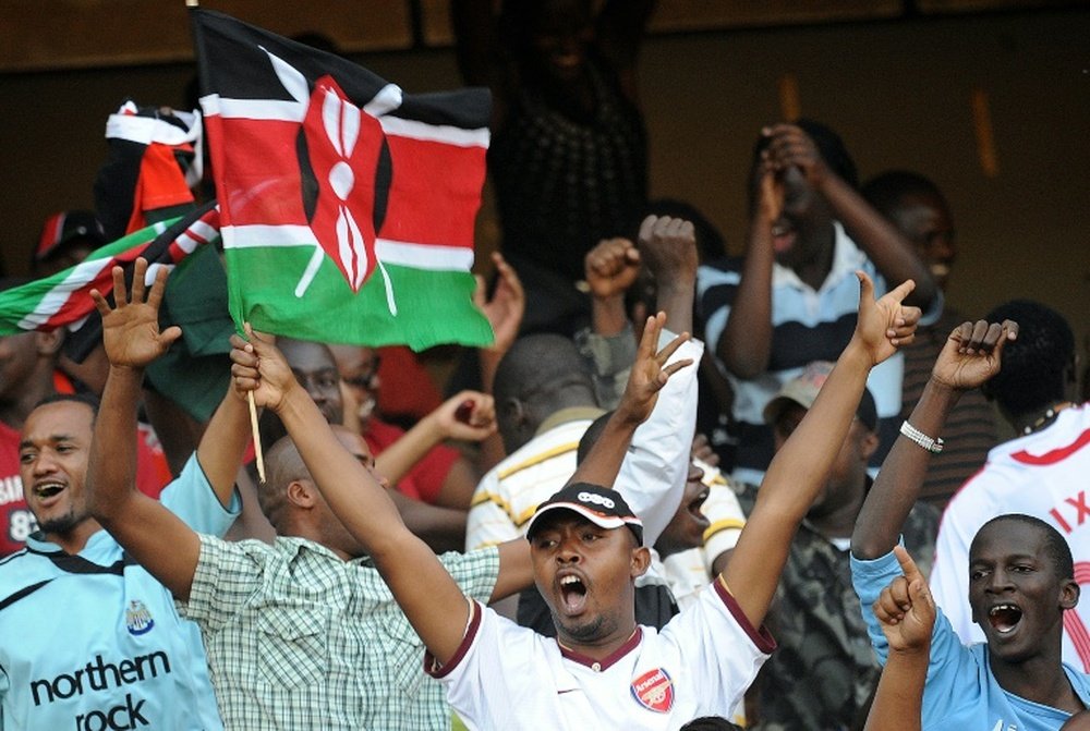 Kenyan football fans celebrate in Nairobi on November 14, 2009