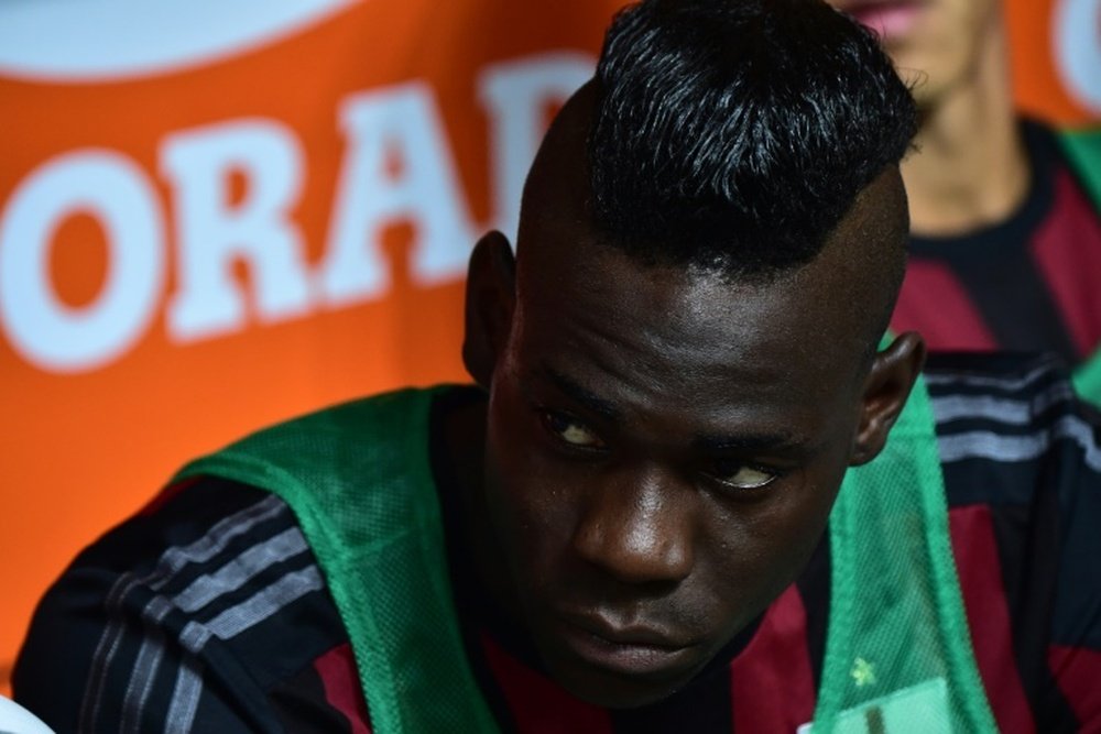 AC Milans forward from Italy Mario Balotelli, pictured on August 29, 2015, was snubbed as Italy coach Antonio Conte revealed a 27-man squad for the Azzurris final 2016 qualifiers