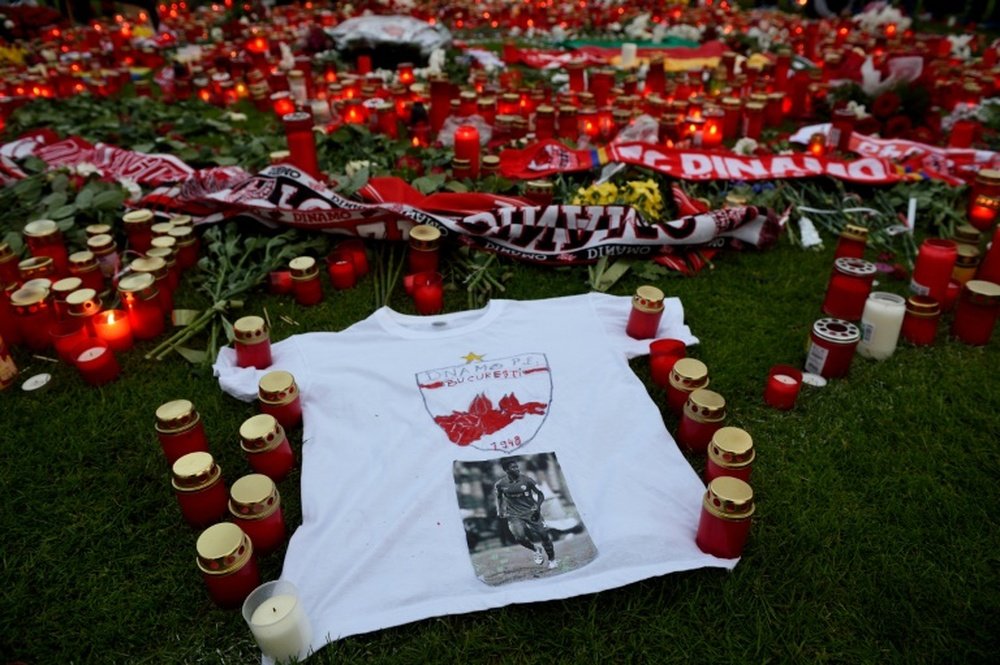 Football fans hold a vigil in memory of late Cameroonian international Patrick Ekeng. BeSoccer