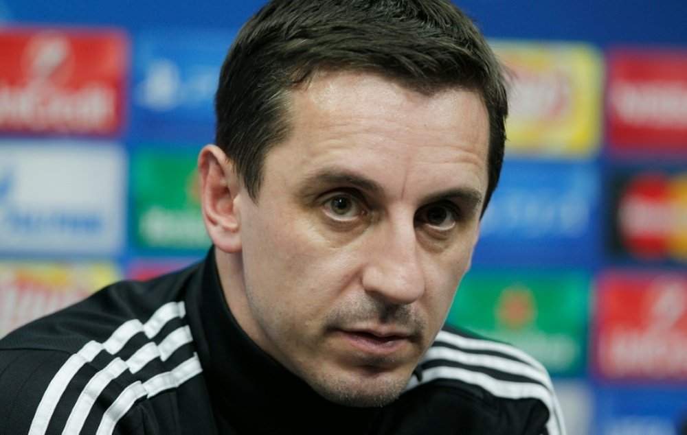 Valencias coach Gary Neville looks on during a press conference at the Valencias Sport City in Valencia on December 8, 2015, on the eve of the UEFA Champions League match Valencia CF vs Lyon