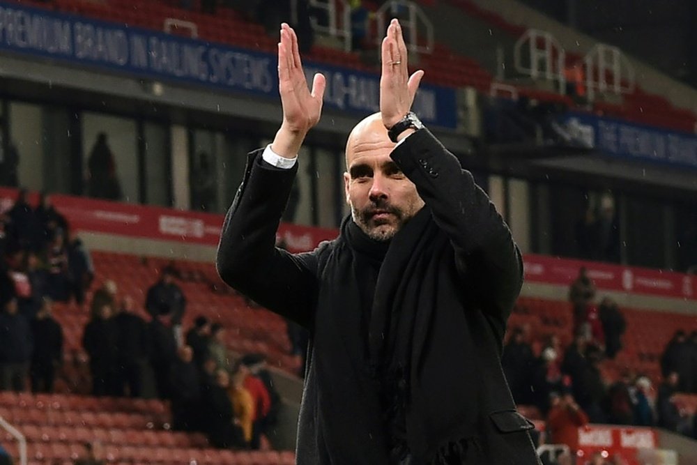 Guardiola plays down hopes of clinching title in derby