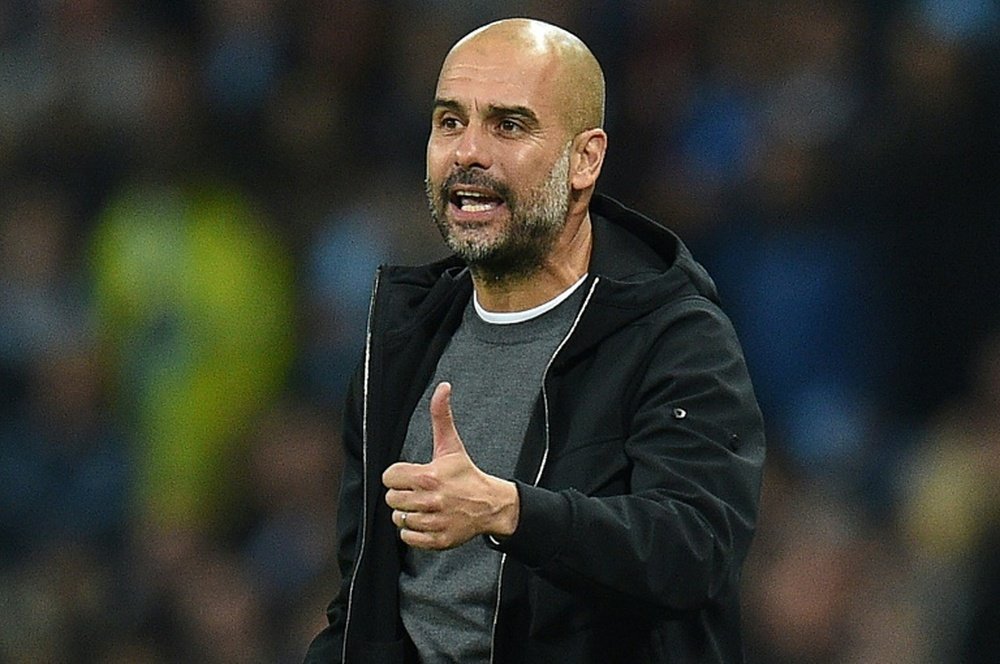 Guardiola insists he isn't concerned by his players' off-field activities. AFP