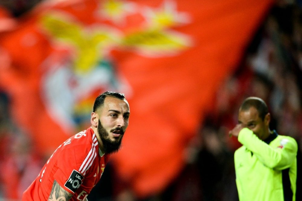 Benficas forward Kostas Mitroglou celebrates after scoring against SC Braga during the Portuguese Liga football match in Lisbon on April 1, 2016