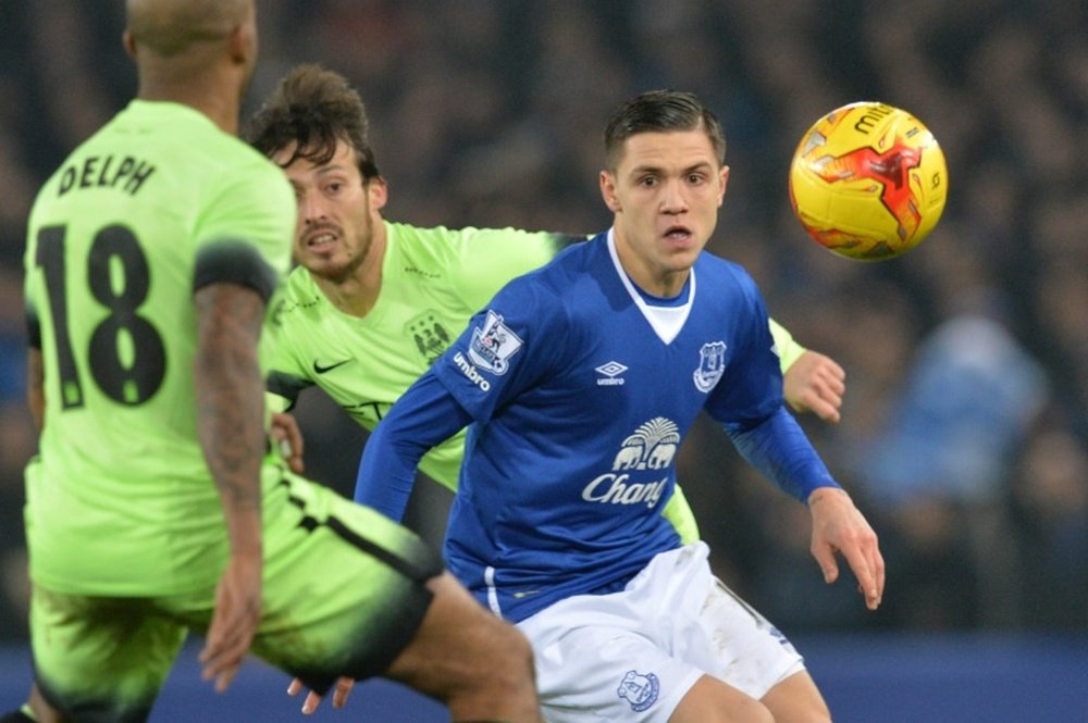 Besic (R) in action for Everton. AFP