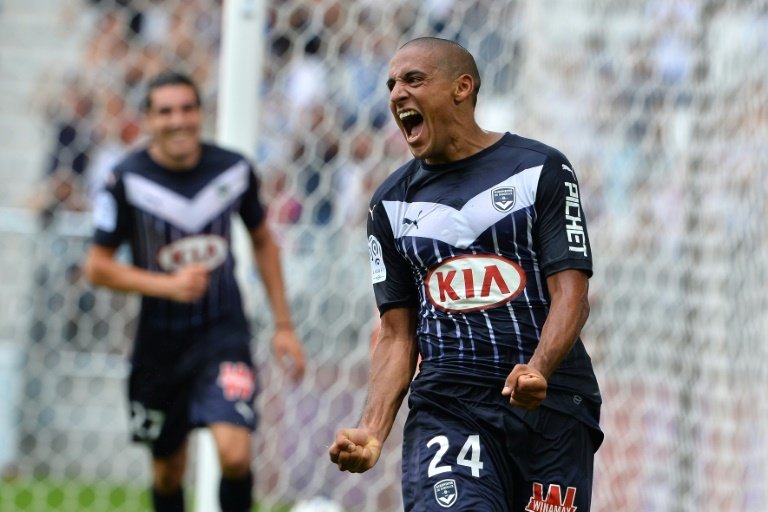 Bordeaux's midfielder Wahbi Khazri celebrates after scoring a goal during a French Ligue 1 football match between against Nantes on August 30, 2015 at the Nouveau stade in Bordeaux, southwestern France