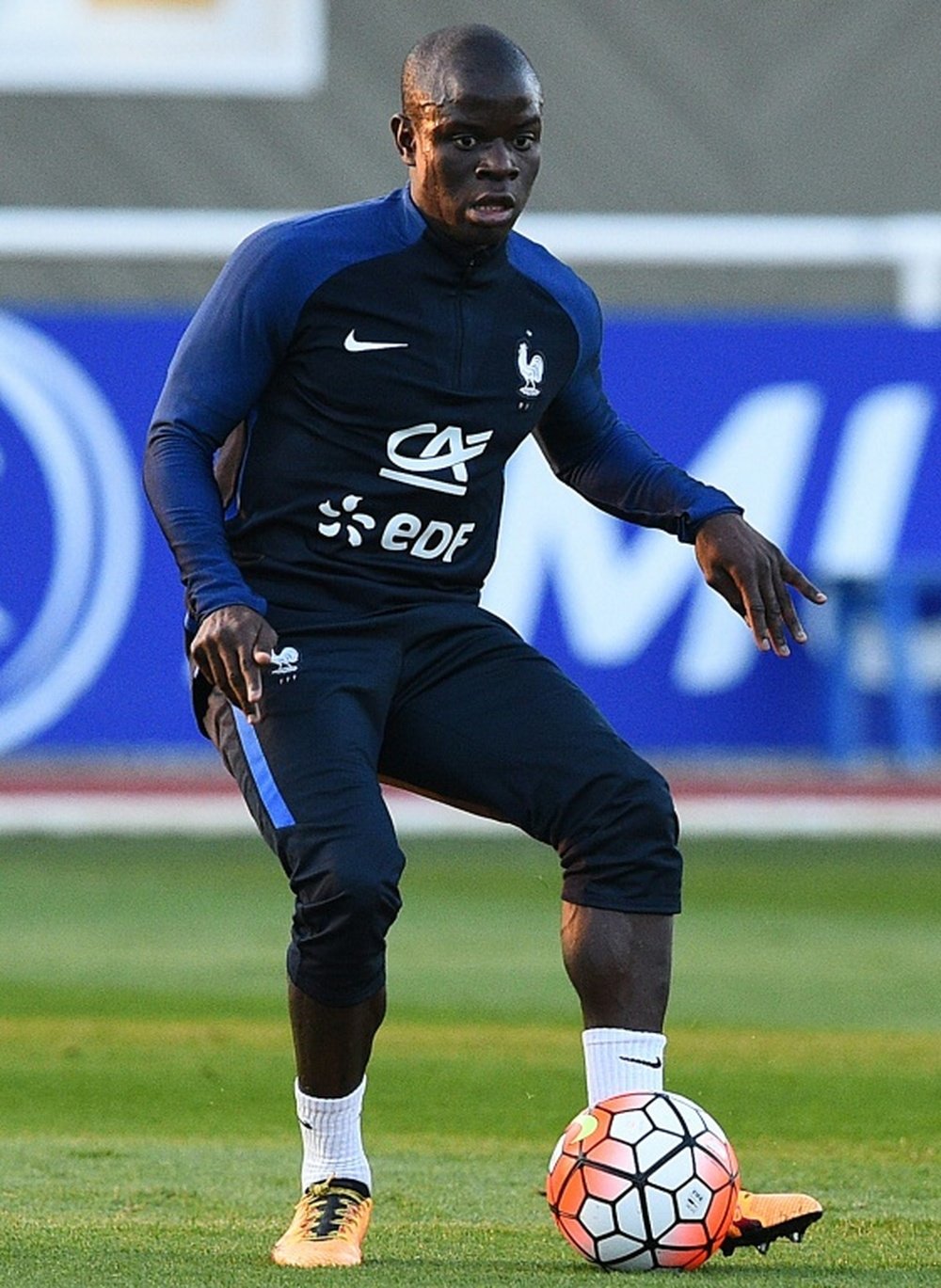 Midfielder N'Golo Kante trains with his French teammates
