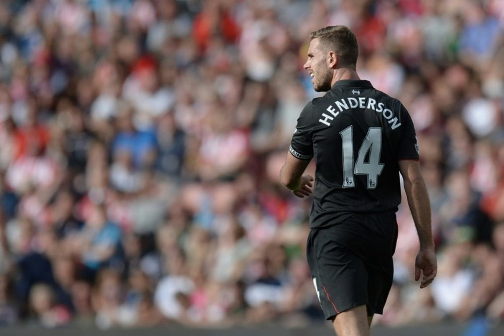 Liverpool captain Jordan Henderson thinks that Liverpool is on the right way. AFP