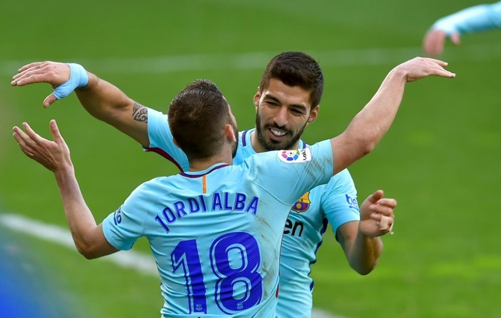Suarez and Alba helped Barca to the feat. AFP
