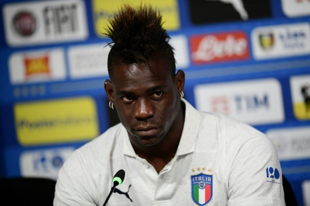 Mario Balotelli did not miss the Euro 2020 final, but he watched it was his car. AFP