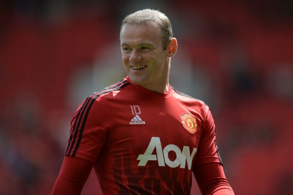 Manchester Uniteds Wayne Rooney says he is excited about working with new boss Jose Mourinho