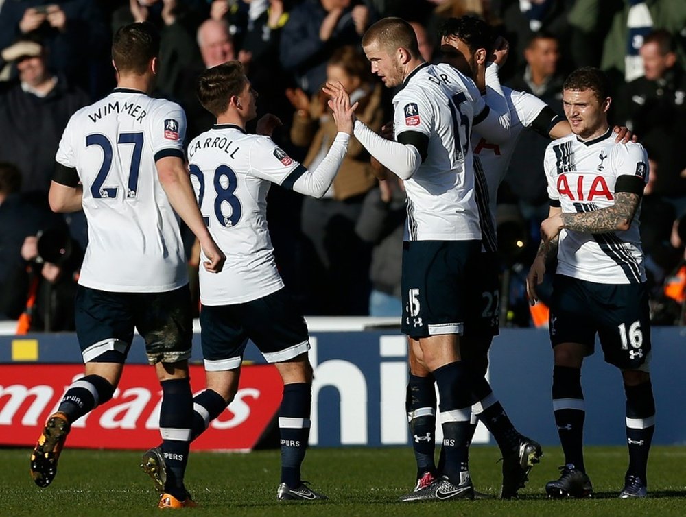 Tottenham Hotspurs Eric Dier (centre) celebrates after scoring his teams second goal during the English FA Cup fourth round match against Colchester United, on January 30, 2016
