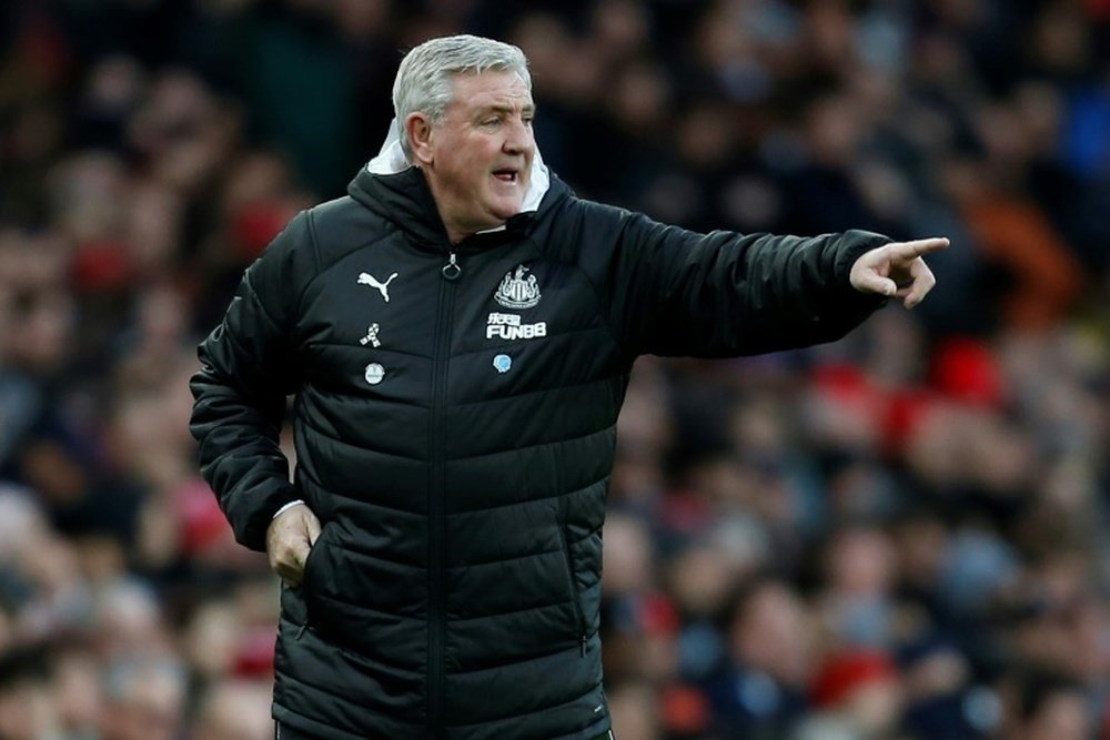 Steve Bruce will continue in charge of Newcastle. AFP