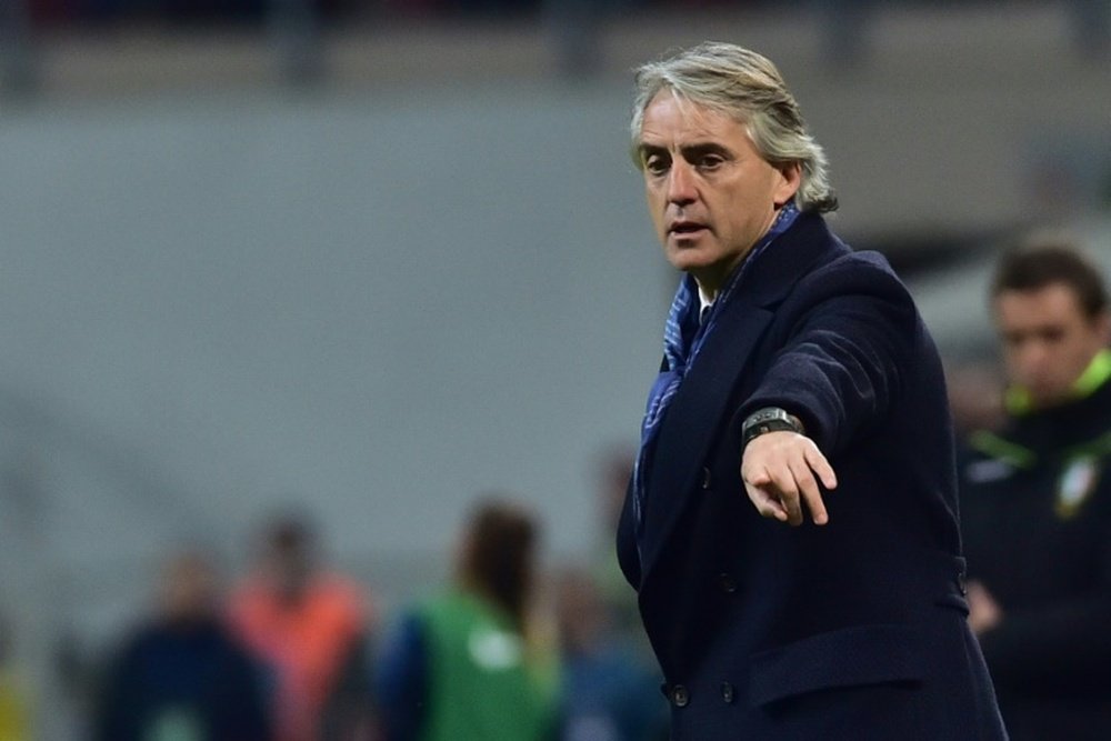 Mancini is taking over as manager of his country. AFP