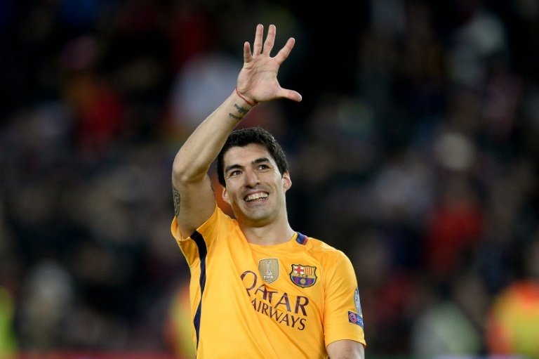 Suarez double salvages Barcelona against 10-man Atletico