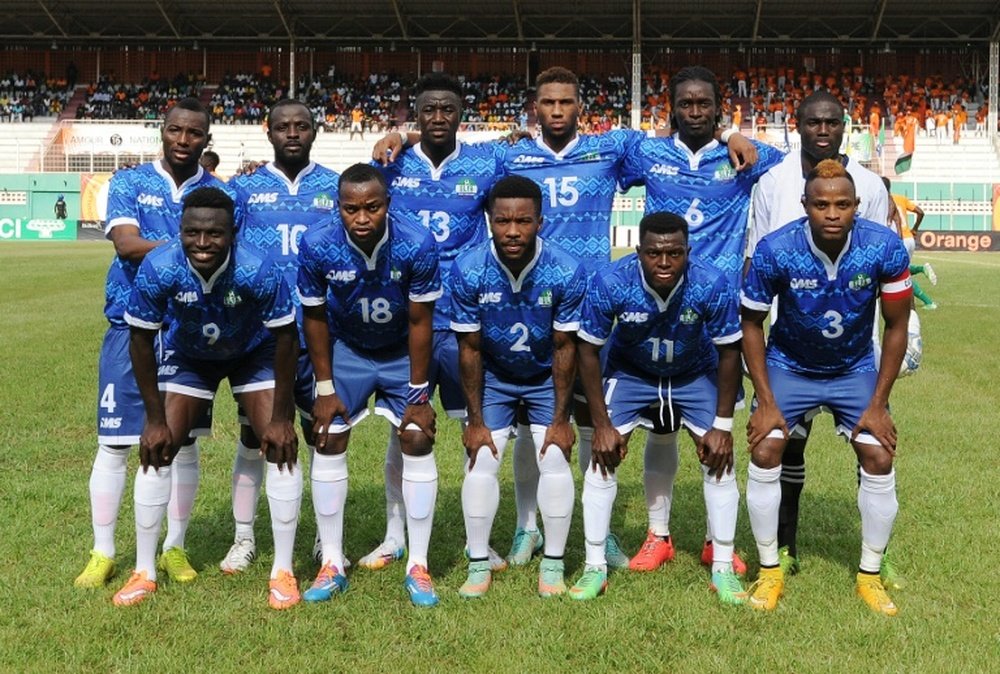 Sierra Leones national football team players pose prior to an African Cup of Nations 2015 qualifying football match Ivory Coast vs Sierra Leone on November 14, 2014 at the Houphouet Boigny stadium in Abidjan