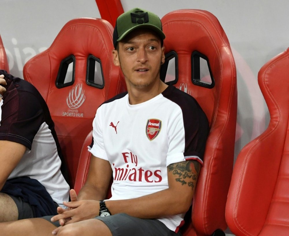 Mesut Ozil has advertised his new hobby on social media. AFP