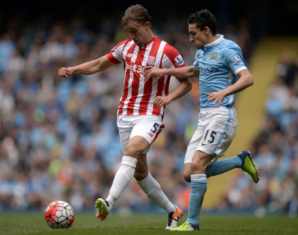 Marc Muniesa (left) returns to LaLiga side Girona. AFP