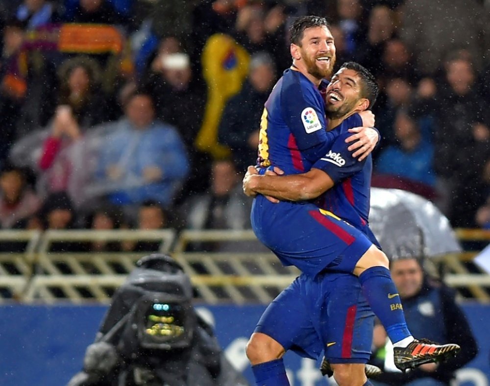 Leo Messi y Luis Suárez están en racha. AFP