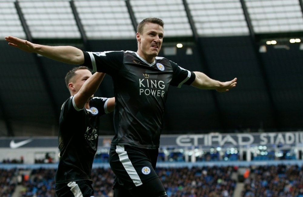 Robert Huth celebrates scoring Leicesters third goal against Manchester City at the Etihad Stadium on February 6, 2016