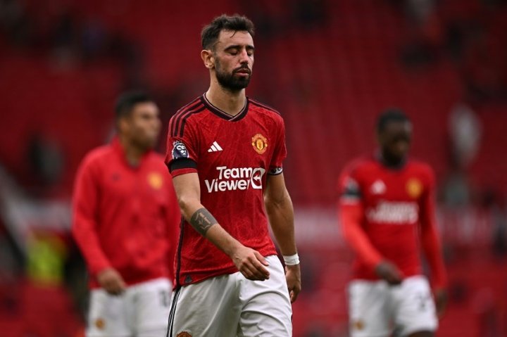 Keane says he would take the captaincy off Bruno Fernandes. AFP