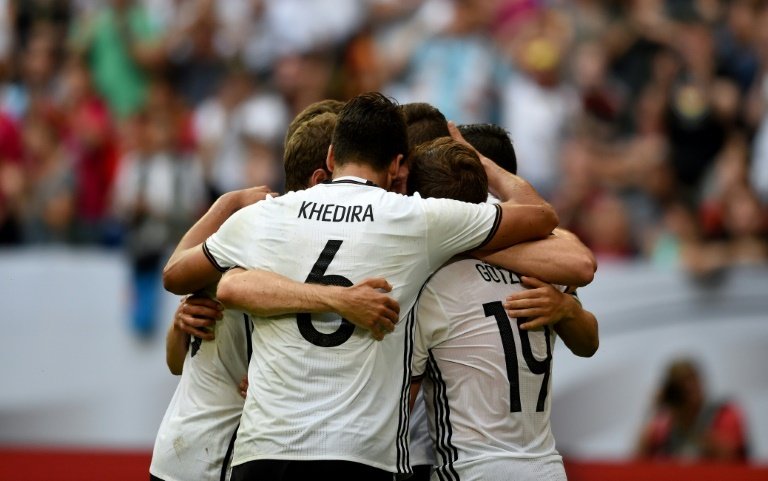 Schweinsteiger returns to help Germany see off Hungary