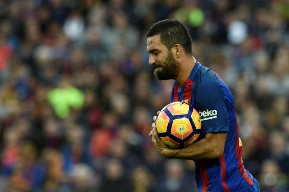Arda Turan fired a 17-minute hat-trick against Monchengladbach. AFP