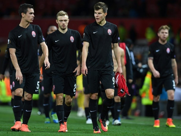 Zorya Luhansk players leave the pitch following their UEFA Europa League Group A match against Manchester United, at Old Trafford in Manchester, on September 29, 2016