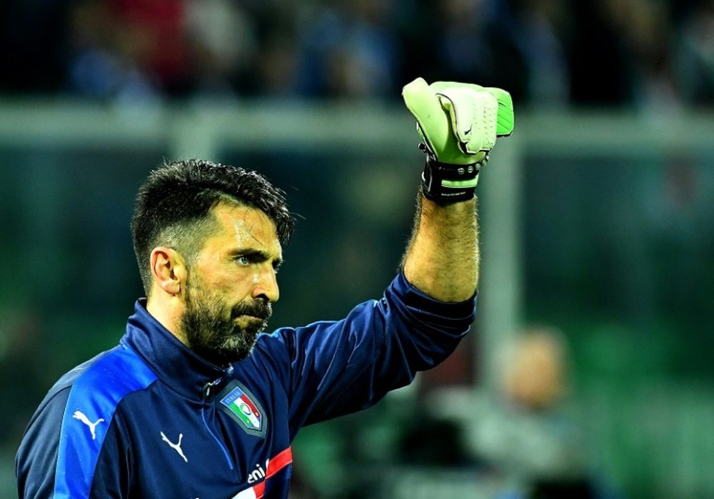 Buffon reaches 1,000 as Italy and Spain cruise in World Cup qualifiers. AFP