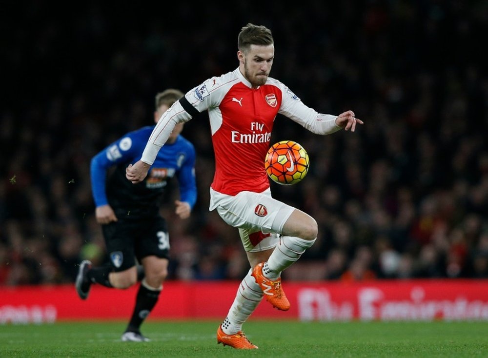 Arsenal's midfielder Aaron Ramsey controls the ball during the English Premier League football match between Arsenal and Bournemouth at the Emirates Stadium in London on December 28, 2015