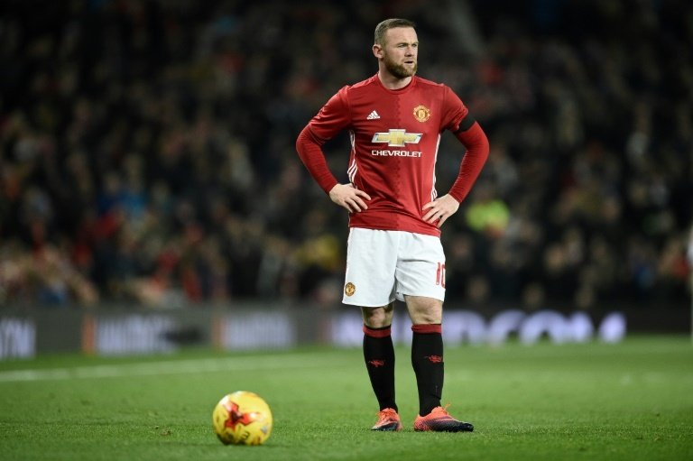 Rooney could play tomorrow. AFP