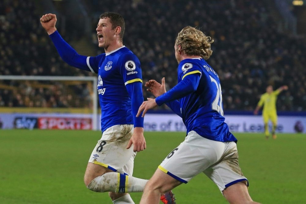 Evertons midfielder Ross Barkley (L) celebrates with Tom Davies after scoring their second goal on December 30, 2016