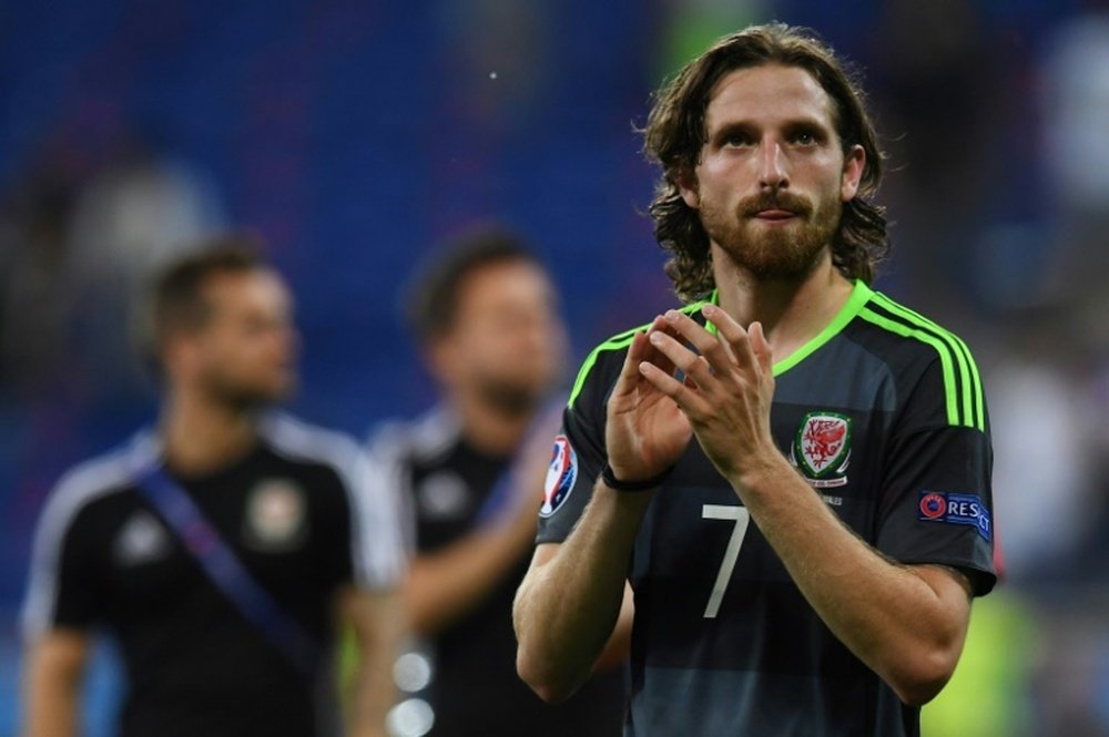Wales midfielder Joe Allen reacts at the end of the Euro 2016 semi-final football match between Portugal and Wales on July 6, 2016