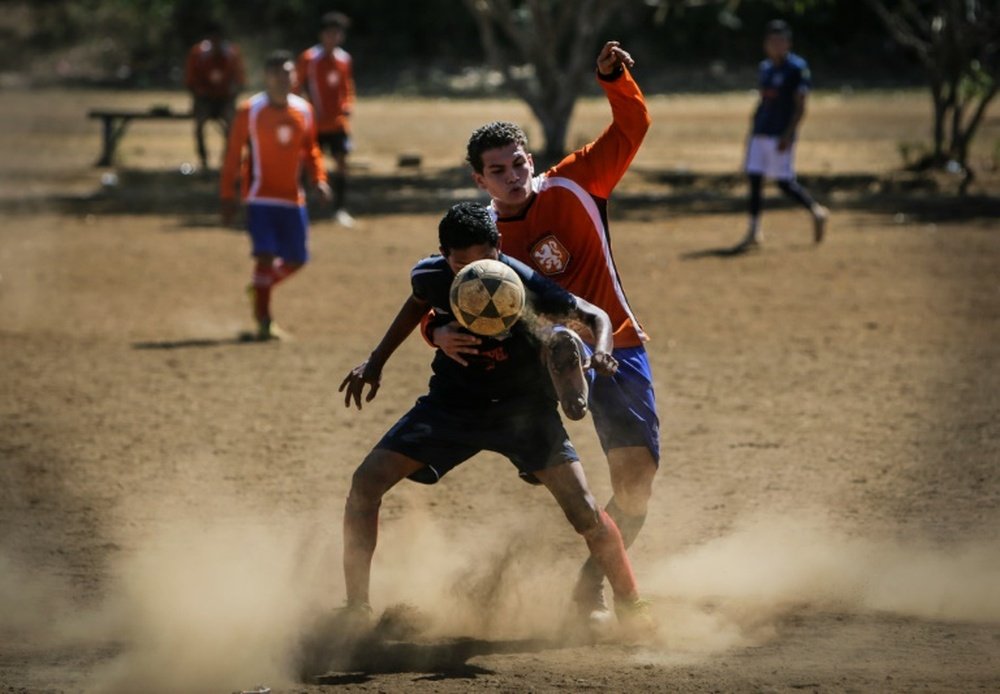 Youth team Titans of Jesus play football against another youth team at the Don Bosco Youth Centre in Managua