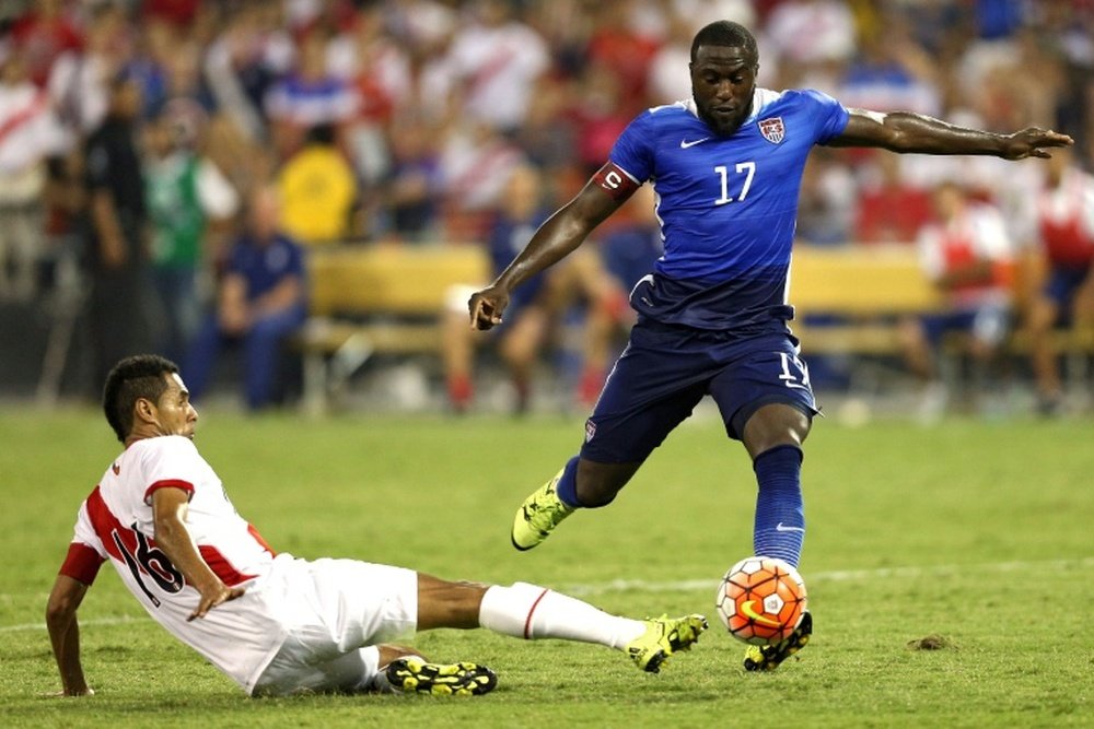 Jozy Altidore of the United States takes the ball past Carlos Lobaton of Peru in the second half during an international friendly at RFK Stadium on September 4, 2015 in Washington, DC