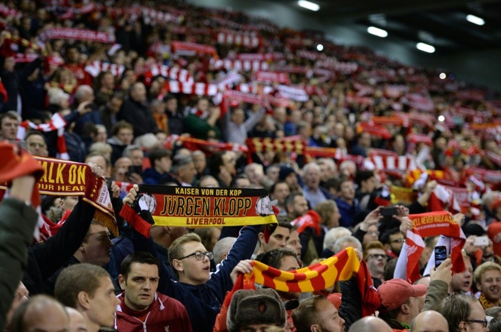 Liverpool fans cheer before a UEFA Europa League group B football match between Liverpool FC and FC Rubin Kazan at Anfield in Liverpool, England, on October 22, 2015