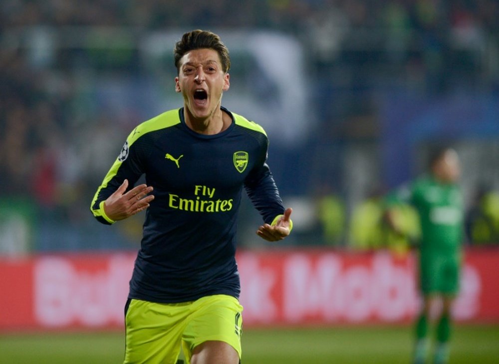 Ozil celebrating a goal in November. AFP