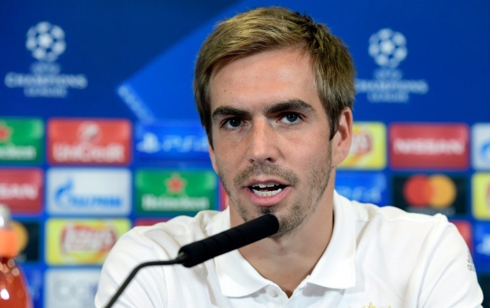 Bayern Munichs defender Philipp Lahm attends a press conference at the Vicente Calderon stadium in Madrid on September 27, 2016 on the eve of their UEFA Champions league match against Atletico de Madrid